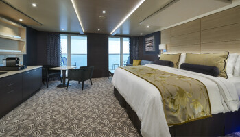 1548636712.5013_c354_Norwegian Cruise Lines Norwegian Joy Accommodation Concierge Penthouse with Balcony.jpg